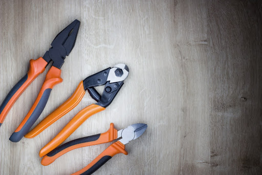 Combination pliers, diagonal cutting pliers and wire rope cutter. Tools for cutting solid materials and multi strand cables. Professional ergonomic tools.